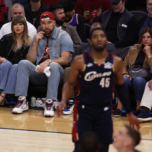 Taylor Swift and Travis Kelce watch the second half of Game 3 in the Eastern Conference finals NBA basketball playoffs series between the New York Knicks and the Cleveland Cavaliers in Cleveland, Saturday, May 23, 2026. (AP Photo/Tim Phillis)