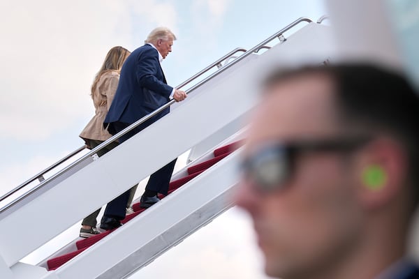 President Donald Trump and first lady Melania Trump, board Air Force One, Friday, July 11, 2025, at Joint Base Andrews, Md., en route to Texas. (AP Photo/Jacquelyn Martin)