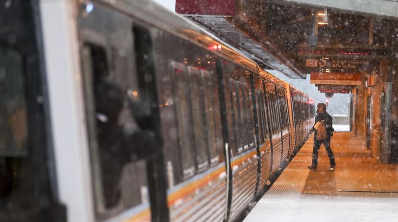 A commuter prepares to board a MARTA train in December ALYSSA POINTER/ALYSSA.POINTER@AJC.COM AJC File Photo