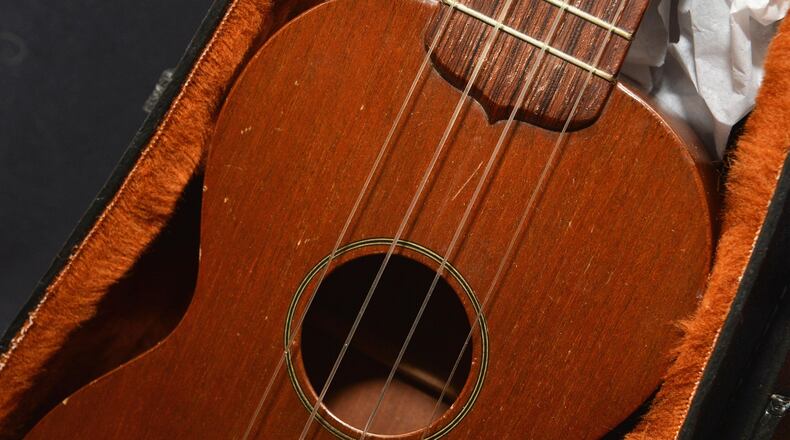 NEW YORK, NY - DECEMBER 03:  Elvis Presley's ukulele gifted to Hank Garland by Presley on display at "Icons & Idols: Rock n' Roll" on December 3, 2013 in New York City.  (Photo by Slaven Vlasic/Getty Images)