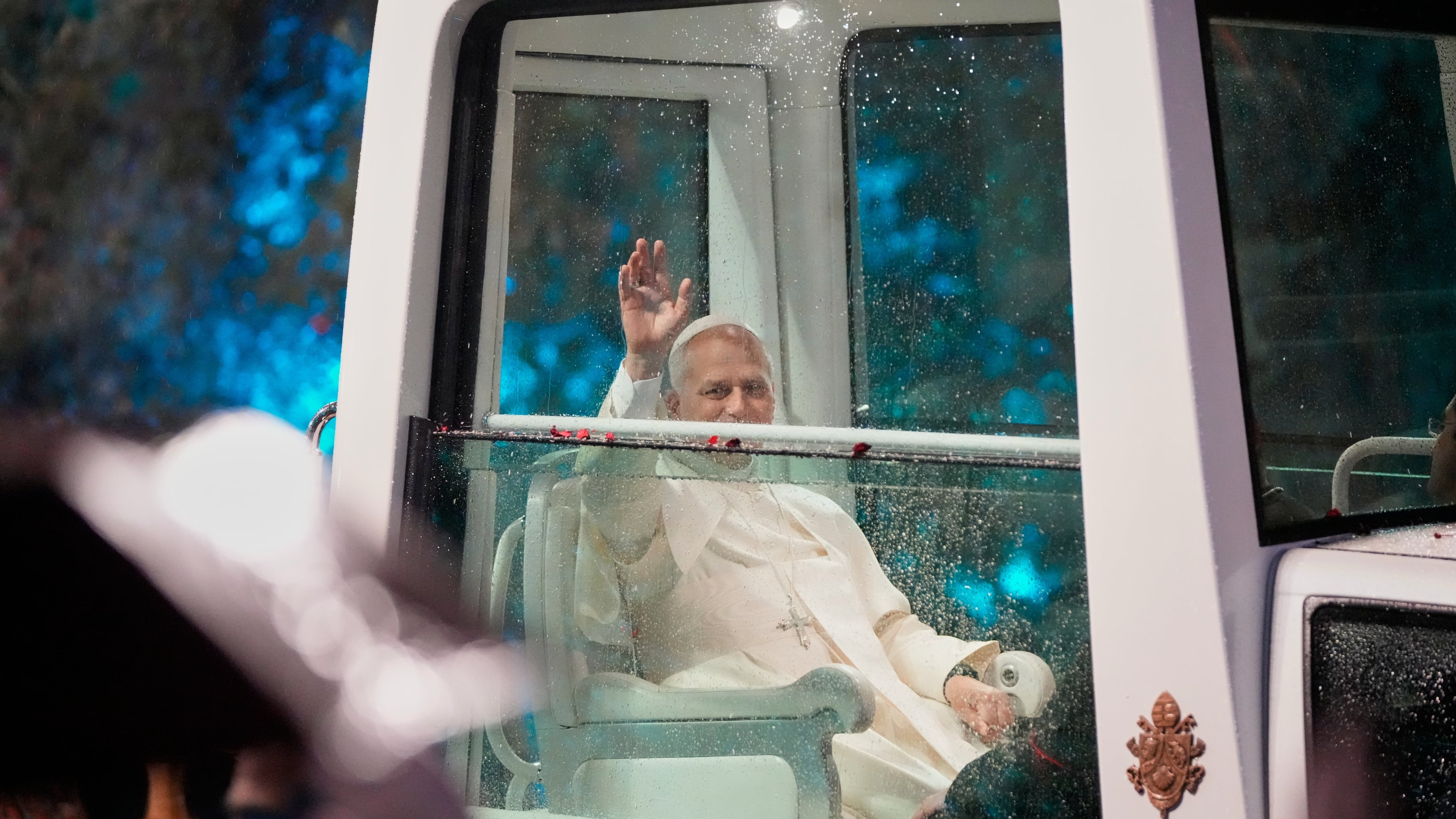 Pope Leo XIV waves as he arrives for a welcoming ceremony at the presidential palace in Baabda, east of Beirut, Lebanon, Sunday, Nov. 30, 2025.(AP Photo/Hassan Ammar)