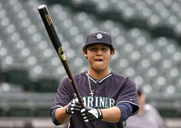 Alex Jackson was widely regarded as the best high school player in the 2014 draft, but the Mariners converted him from catcher to outfielder and he was pretty much a bust. The Braves traded for him last winter, moved him back to catcher, and he thrived in 2017. (AP file photo)