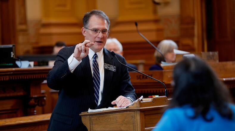 State Sen. William Ligon, a Republican from Brunswick, speaks in favor of a new statewide voting system during a debate Wednesday on the Senate floor. The Senate then voted to approve the legislation, House Bill 316. BOB ANDRES / bandres@ajc.com