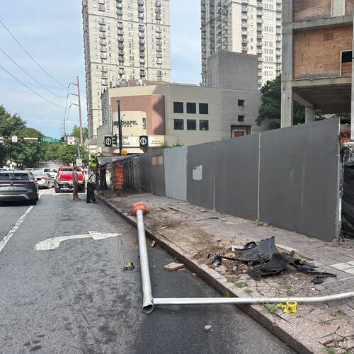 The collapsed scaffolding prompted speculation and questions on social media and among Midtown residents. (Zachary Hansen/AJC)