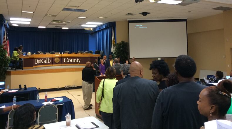 Residents lined up before the DeKalb County Commission’s meeting to speak against a proposed deal to build a soccer stadium for Atlanta United along Memorial Drive. MARK NIESSE / MARK.NIESSE@AJC.COM