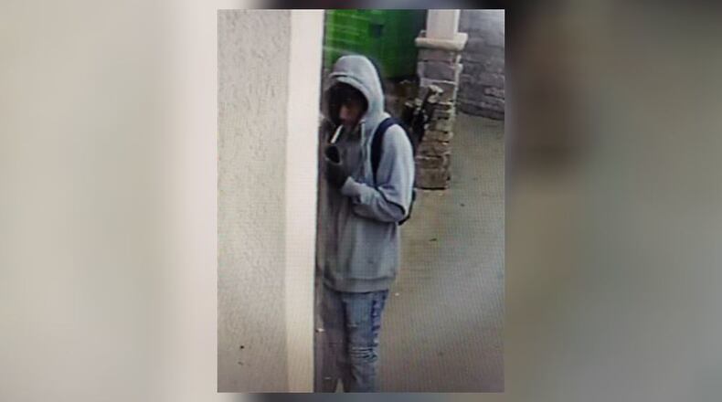 DeKalb County police released footage of a person of interest in a deadly shooting at a Lithonia gas station Wednesday.