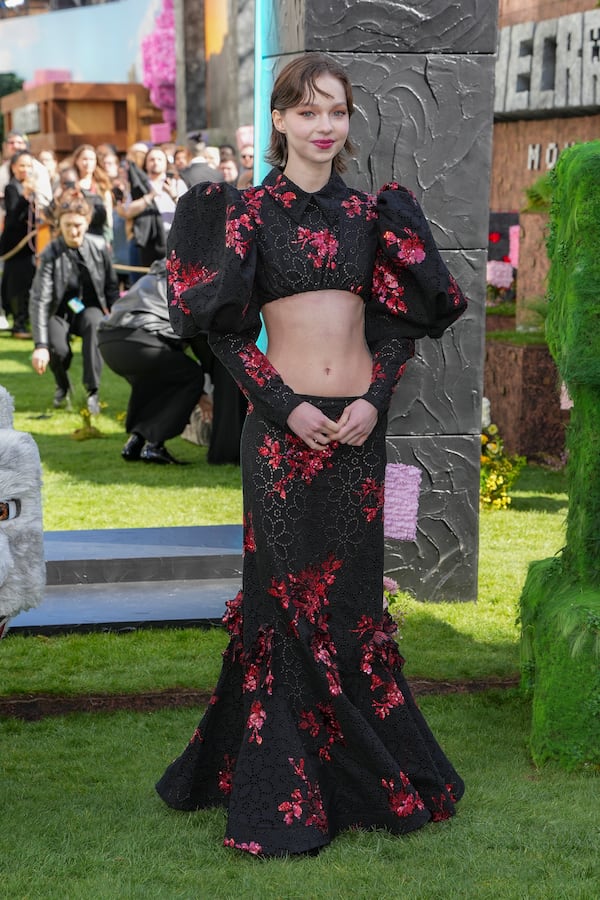 Emma Myers poses for photographers upon arrival at the World premiere of A Minecraft Movie on Sunday, March 30, 2025, in London. (Photo by Scott A Garfitt/Invision/AP)