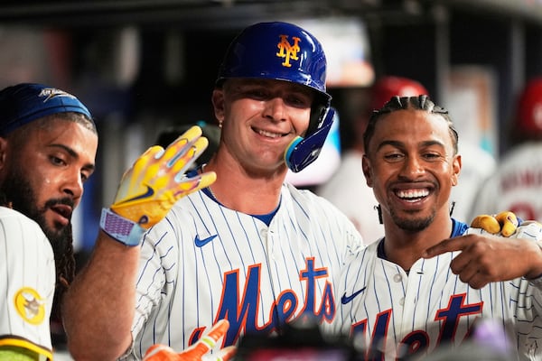New York Mets' Pete Alonso celebrates his three-run home run during sixth inning at the MLB baseball All-Star game between the American League and National League, Tuesday, July 15, 2025, in Atlanta. (AP Photo/Brynn Anderson)