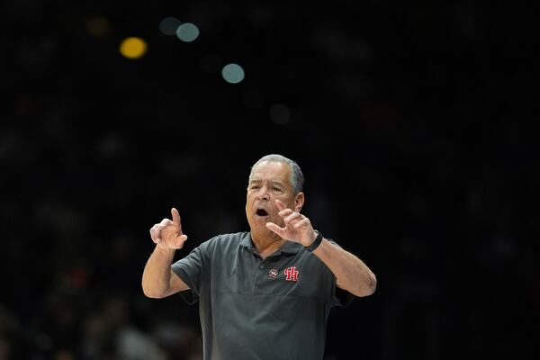 Houston head coach Kelvin Sampson is seen on the sidelines during the first half in the Sweet 16 of the NCAA college basketball tournament against Purdue Friday, March 28, 2025, in Indianapolis. (AP Photo/Michael Conroy)