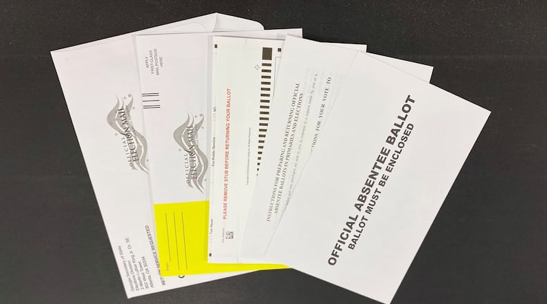 Absentee ballot packets mailed to voters include a return envelope, a ballot, instructions and a privacy sleeve. The privacy sleeve replaced the inner envelope that in previous elections enclosed absentee ballots.