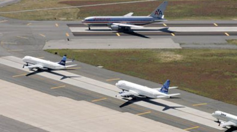 Four big mergers have condensed the industry. The Justice Department, which approved them all, now is investigating whether the remaining players are coordinating capacity to keep fares higher.