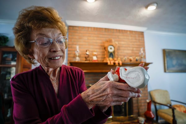 When collecting weekly subscription fees, Marie George Myers' customers would give her a cookie or other treat, like this Santa Claus figurine. (Miguel Martinez/AJC)