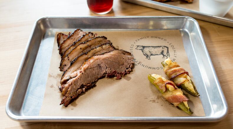 4 Rivers Smokehouse Brisket and smoked jalapenos. Photo credit- Mia Yakel.