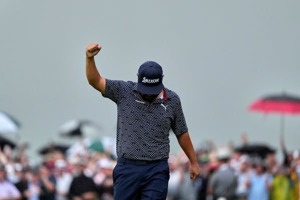 J.J. Spaun celebrates sinking a birdie putt to win the U.S. Open golf tournament at Oakmont Country Club Sunday, June 15, 2025, in Oakmont, Pa. (AP Photo/Carolyn Kaster)