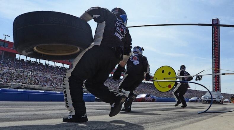 Kevin Harvick makes a pit stop during the NASCAR 400 mile auto race Sunday, March 20, 2016, at Auto Club Speedway in Fontana, Calif. (AP Photo/Will Lester)