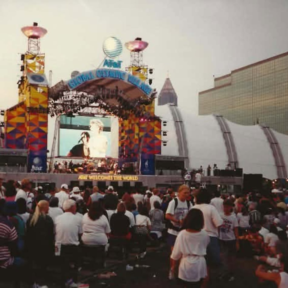 Crowds gather near a stage at the 1996 Olympic Village in Atlanta. Felicia Schlafer remembers the city as "electric," a visit that ultimately inspired her to move to metro Atlanta. (Courtesy of Felicia Schlafer)