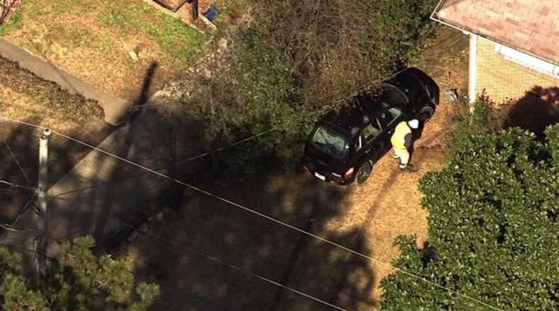 Carjacking chase ends with car crashing into house (CREDIT: Channel 2 Action News)