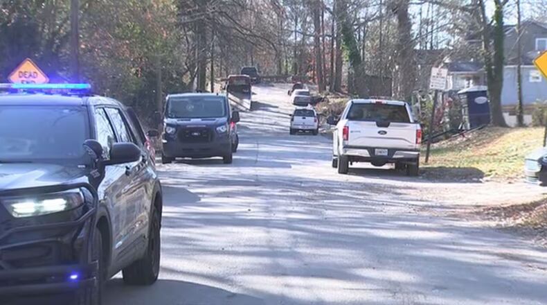 A body was found inside a burning vehicle in northwest Atlanta on Sunday morning, officials said.