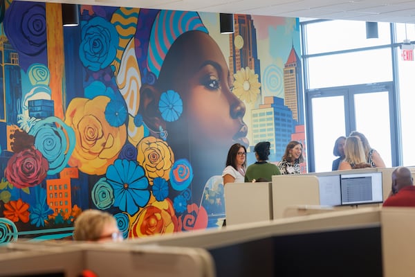 People tour the new TriNet office in Dunwoody on Aug. 18, 2026. It is one of the largest office announcements of the last few years and is an anchor for High Street. (Arvin Temkar/AJC)