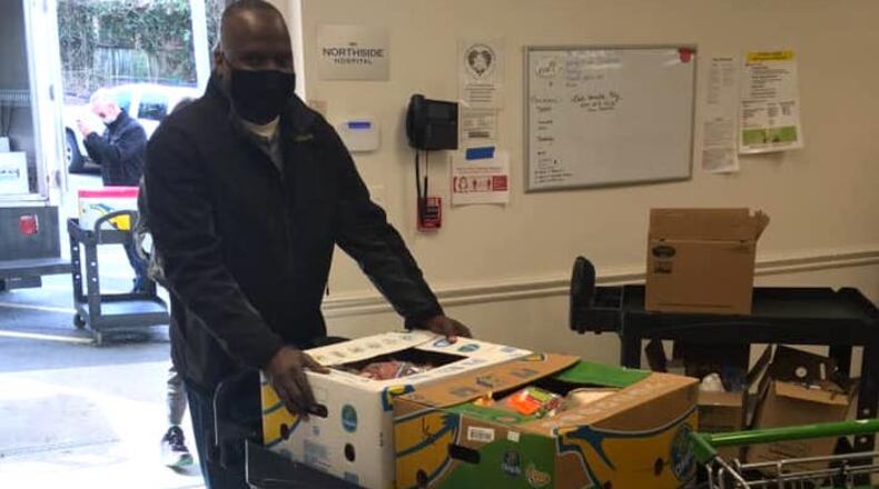 Community Assistance Center volunteer, Martin Willis, helps support the food pantry. (Courtesy Community Assistance Center)