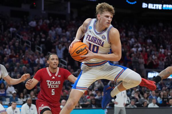 Florida forward Thomas Haugh (10) rebounds against Texas Tech during the second half in the Elite Eight of the NCAA college basketball tournament, Saturday, March 29, 2025, in San Francisco. (AP Photo/Marcio Jose Sanchez)