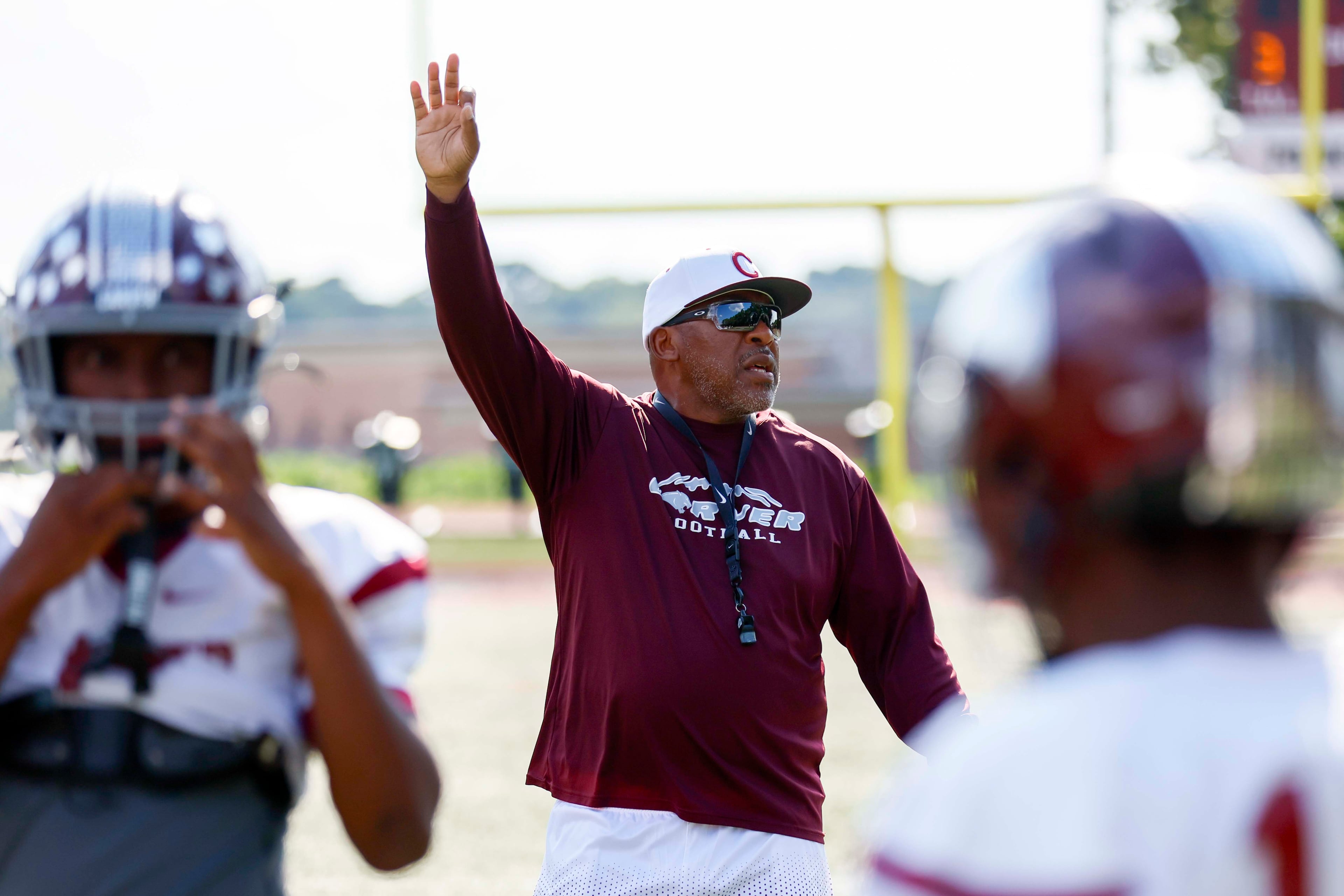 Throughout Darren Myles' 20-year tenure, he has succeeded both as a coach and an educator, making an impact in the community and leading the Carver High to two regional championships.
(Miguel Martinez/AJC)