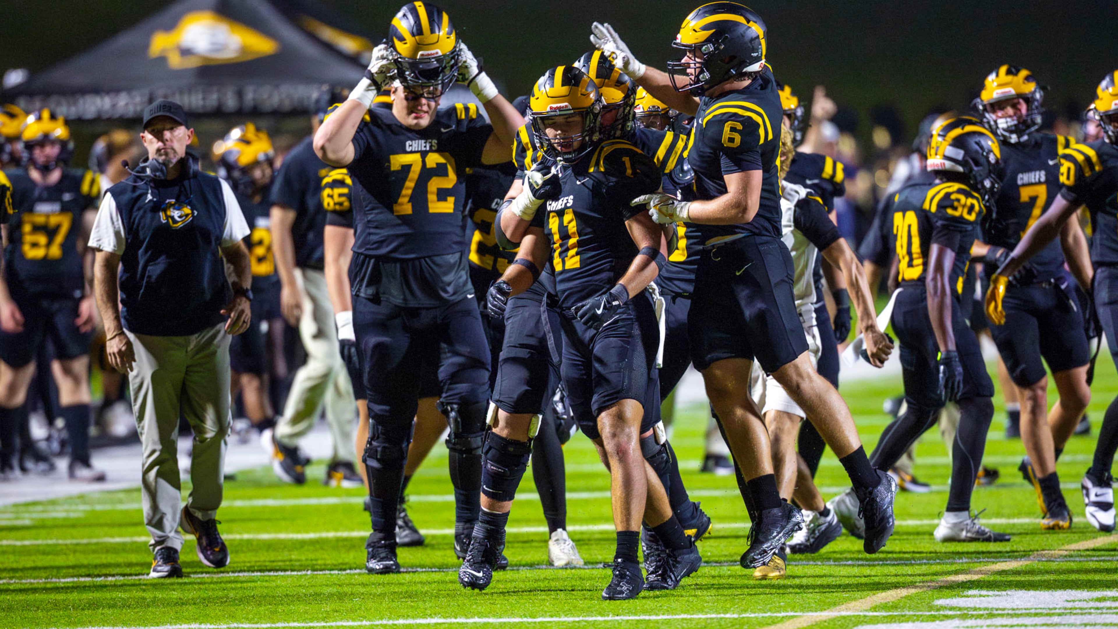 Sequoyah safety Asa Goings (center) celebrates with teammates after making an interception during the second half against Sprayberry on Friday, Sept. 12, 2025 at Skip Pope Stadium in Canton. Sequoyah, which came into the game ranked No. 8 in Class 5A, beat No. 6 Sprayberry 63-20. (Oscar Guevara Saenz for the AJC)
