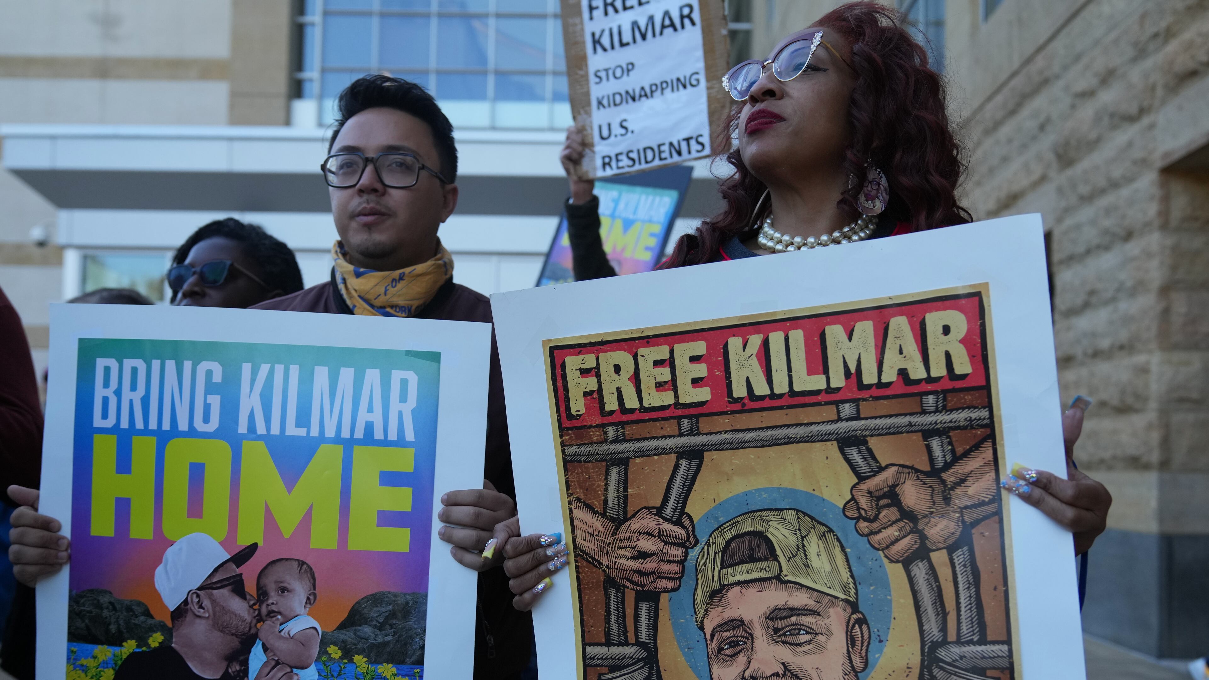 FILE - Activists rally outside of the U.S. District Court District of Maryland ahead of an evidentiary hearing where attorneys for Kilmar Abrego Garcia will seek his immediate release from immigration detention, Oct. 10, 2025, in Greenbelt, Md. (AP Photo/Stephanie Scarbrough, File)