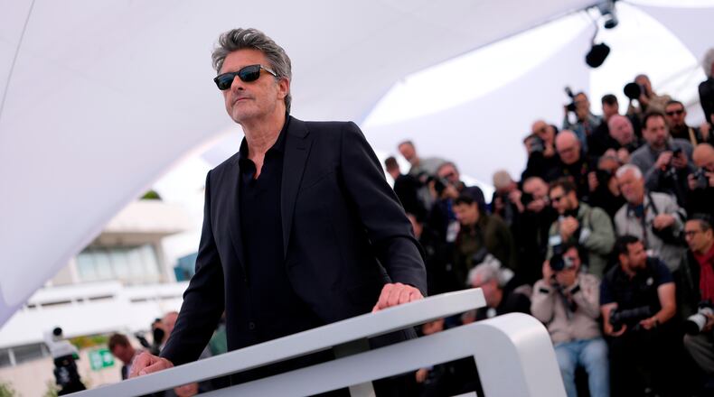 Director Paweł Pawlikowski poses for photographers at the photo call for the film 'Fatherland' during the 79th international film festival, Cannes, southern France, Friday, May 15, 2026. (AP Photo/John Locher)