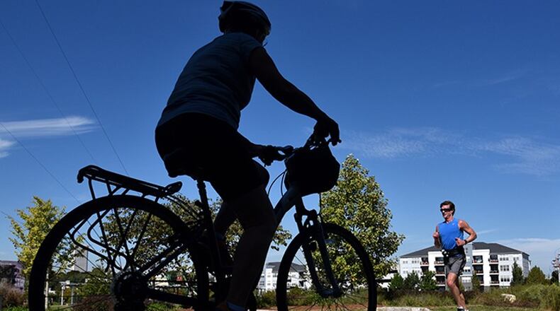 Roswell is seeking residents to serve on a Bicycle and Pedestrian Stakeholder Committee to guide the drafting of a master plan. AJC FILE/BRANT SANDERLIN/BSANDERLIN@AJC.COM