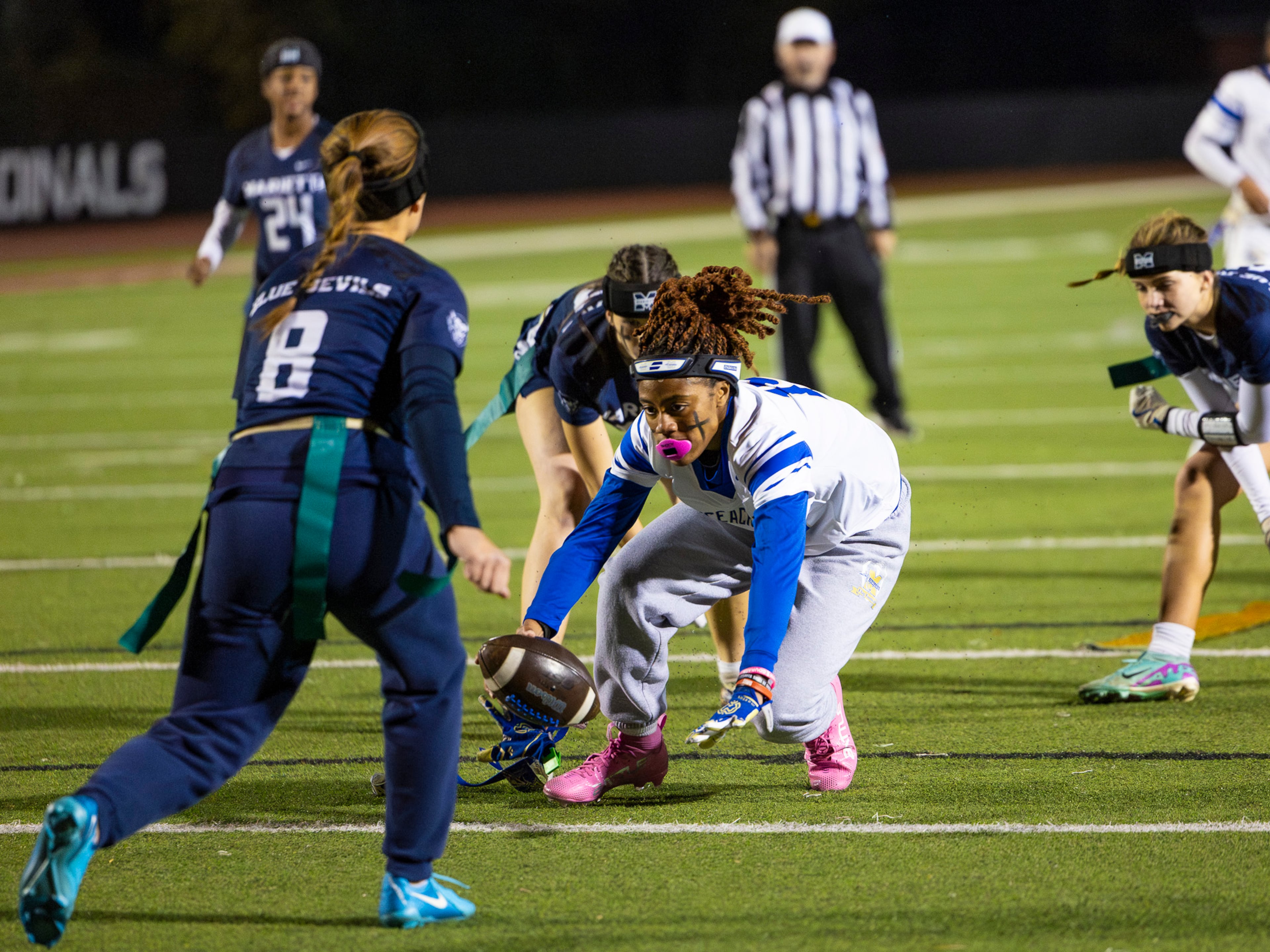 McEachern linebacker Saniyah Dickens (14) catches the ball in a flag football game against Marietta at Osborne High School in Marietta, GA on Monday, November 17th, 2025. (Oscar Guevara Saenz for the AJC)