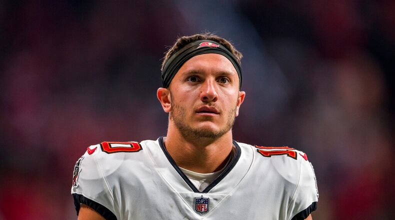 Tampa Bay Buccaneers wide receiver Scotty Miller (10) warms up before an NFL football game against the Atlanta Falcons, Sunday, Jan. 8, 2023, in Atlanta. The Atlanta Falcons won 30-17. (AP Photo/Danny Karnik)