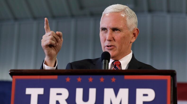 FILE - In this Nov. 3, 2016 file photo, then-Republican vice presidential candidate, Indiana Gov. Mike Pence speaks in Prole, Iowa. Vice President-elect Mike Pence will lead President-elect Donald Trump's transition team, replacing New Jersey Gov. Chris Christie. (AP Photo/Charlie Neibergall, File)