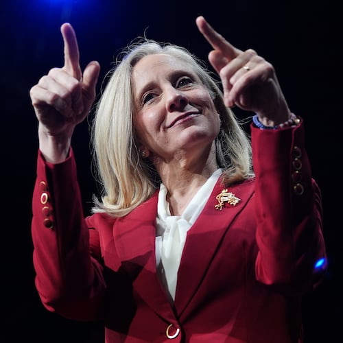 Democrat Abigail Spanberger points out at the crowd after she was declared the winner of the Virginia governor's race during an election night watch party Tuesday, Nov. 4, 2025, in Richmond, Va. (AP Photo/Stephanie Scarbrough)
