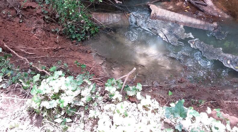 A sewer line broke near a tributary to Nancy Creek in Brookhaven, spilling millions of gallons of sewage. It’s the largest spill in DeKalb County in more than a decade. Photo credit: DeKalb County