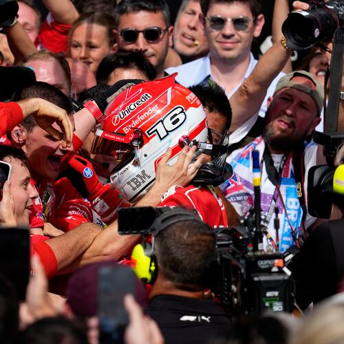 Ferrari driver Charles Leclerc of Monaco celebrates with his team after winning the British F1 Grand Prix, in Silverstone, England, Sunday, July 5, 2026. (AP Photo/Darko Bandic)