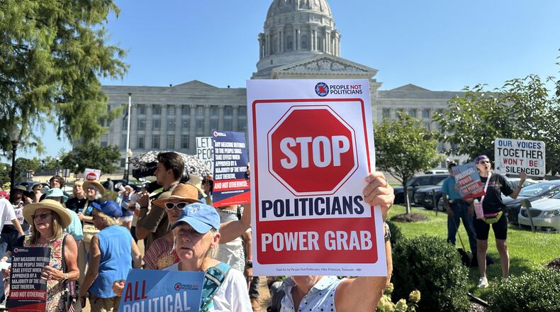 In this photo taken with a smartphone, people opposed to a congressional redistricting plan rally outside the Missouri Capitol in Jefferson City, Mo., Wednesday, Sept. 2, 2026. (AP Photo/David A. Lieb)