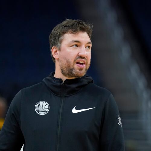 FILE - Golden State Warriors assistant coach Chris DeMarco stands before an NBA preseason basketball game against the Denver Nuggets in San Francisco, Oct. 14, 2022. (AP Photo/Jeff Chiu, File)