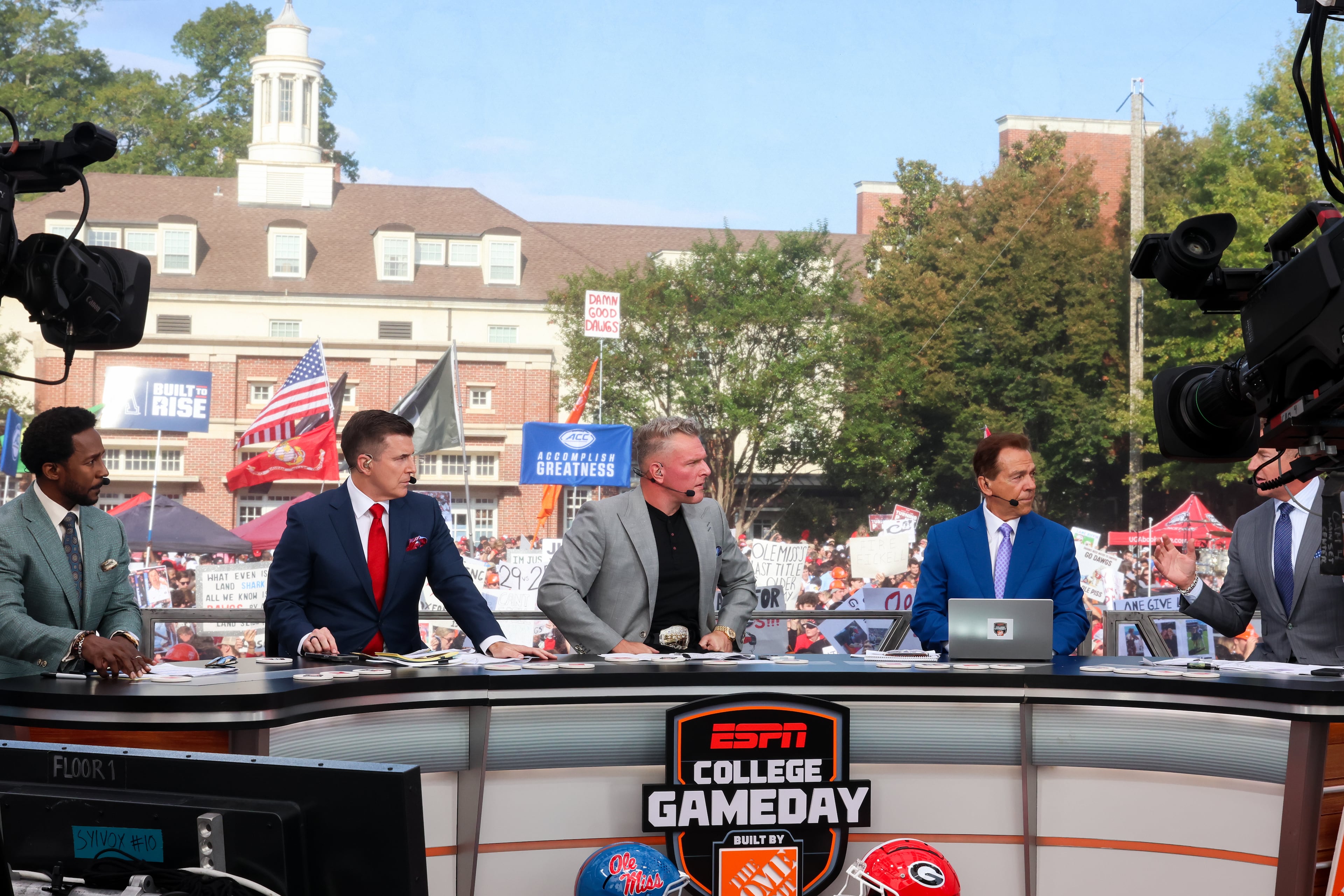 From left, Desmond Howard, Rece Davis, Pat McAfee, Nick Saban, and Kirk Herbstreit talk football during the ESPN College GameDay broadcast from Myers Quad at UGA on Saturday, Oct. 18, 2025. (C.J. Bartunek for the AJC)