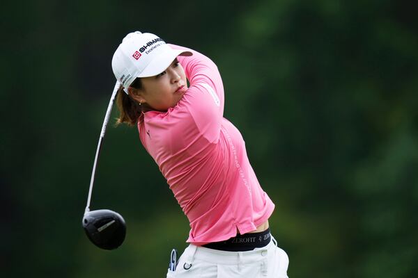 Mao Saigo, of Japan, hits on the tenth hole during the second round of the Chevron Championship LPGA golf tournament Friday, April 25, 2025, in The Woodlands, Texas. (AP Photo/Eric Gay)