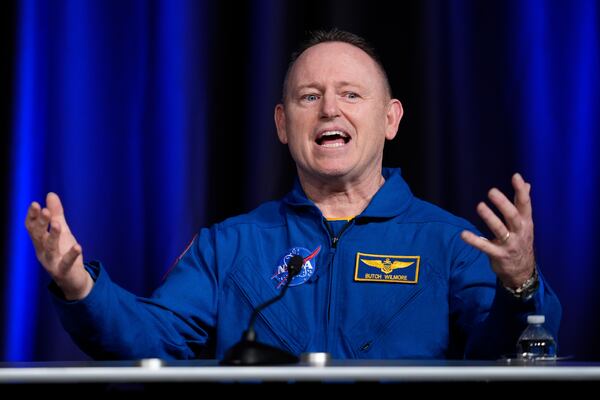 Astronaut Butch Wilmore talks to reporters during a press conference at Johnson Space Center on Monday, March 31, 2025, in Houston. (AP Photo/Ashley Landis)