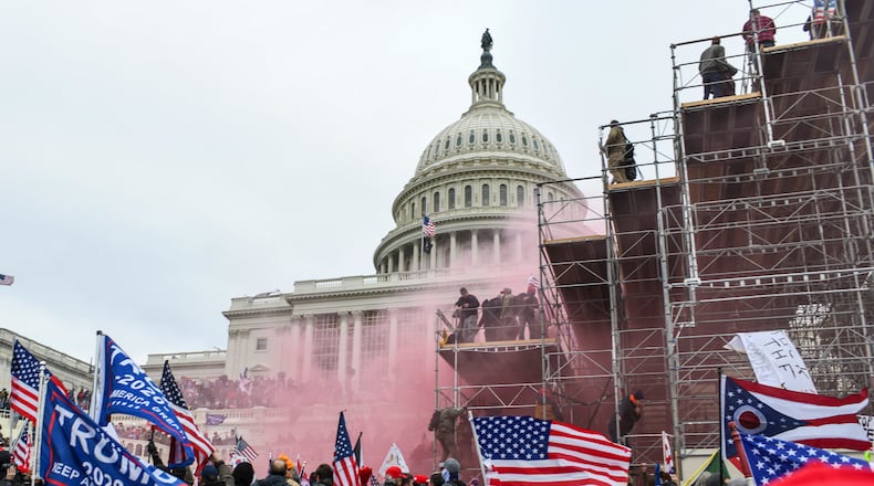 Supporters of President Donald Trump storm the U.S. Capitol in Washington, Jan. 6, 2021. From the start of Trump’s presidency, corporate America has vacillated between supporting his economic agenda and condemning his worst impulses. (Kenny Holston/The New York Times)