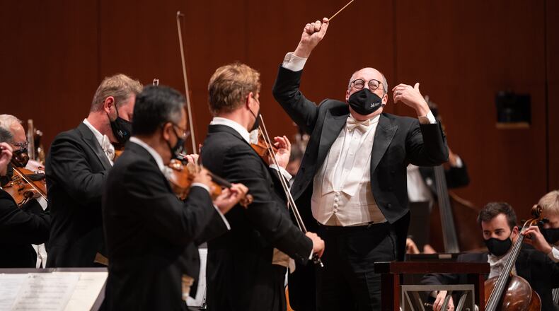 Conductor Robert Spano leads the Atlanta Symphony Orchestra in the "Star Spangled Banner," a tradition before every season-opening concert. / Courtesy of Rand Lines