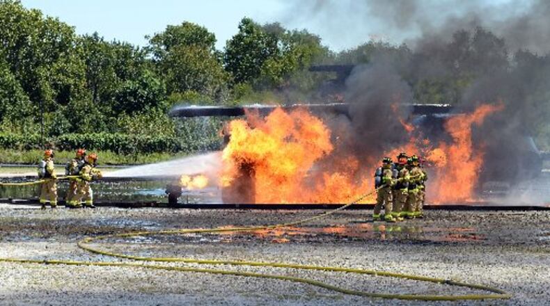 Firefighters at Hartsfield-Jackson Atlanta International Airport will simulate a plane fire for a training exercise. AJC file photo