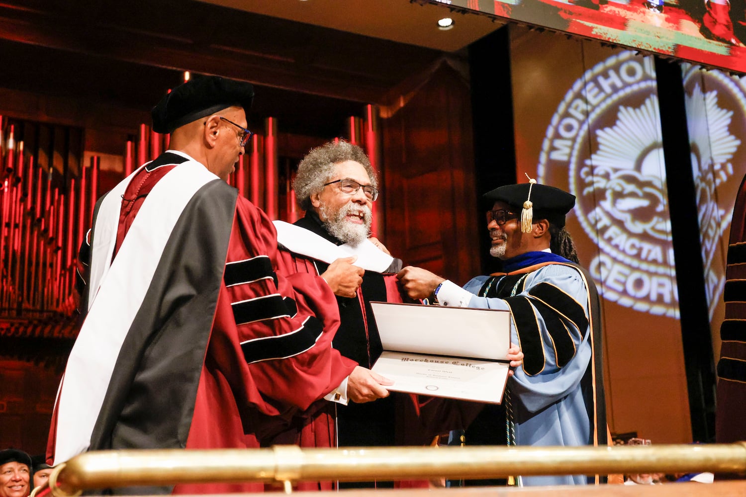  Dr. Cornel West, a theologian, philosopher, and activist, smiles as he is recognized with the Honorary Doctor of Humane Letters during Morehouse College's 141st Commencement Ceremony on Sunday, May 18, 2025.
(Miguel Martinez/ AJC)