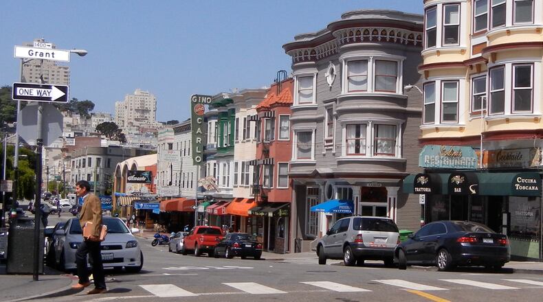 The corner of Grant and Green streets in San Francisco s North Beach is a busy one, with visitors and locals popping into restaurants and shops. credit: Helen Anders