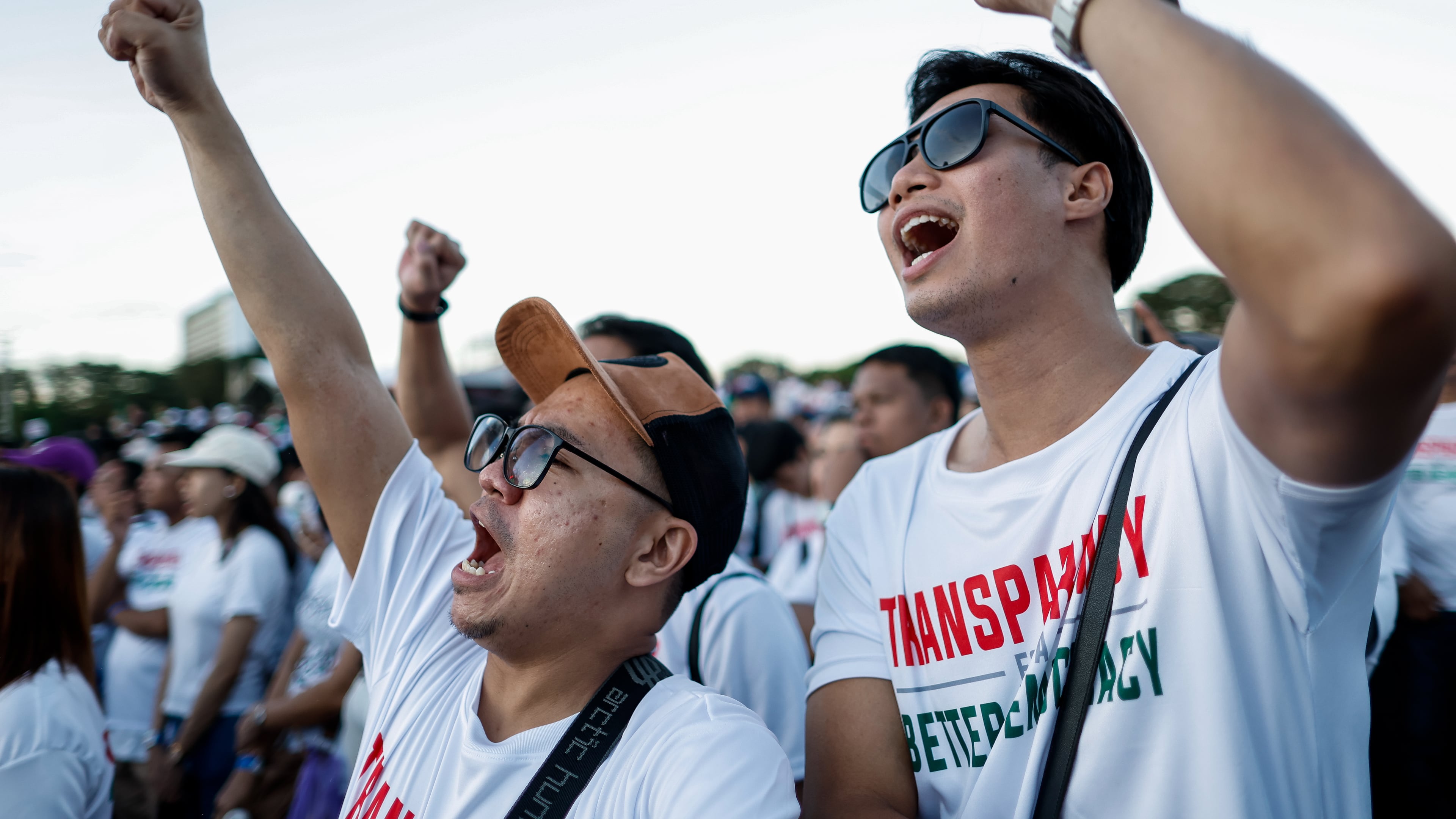 Members of the religious sect Iglesia Ni Cristo (Church of Christ) shout slogans during a three-day anti-corruption rally at Manila's Rizal Park, Philippines on Sunday, Nov. 16, 2025. (AP Photo/Mark Cristino)