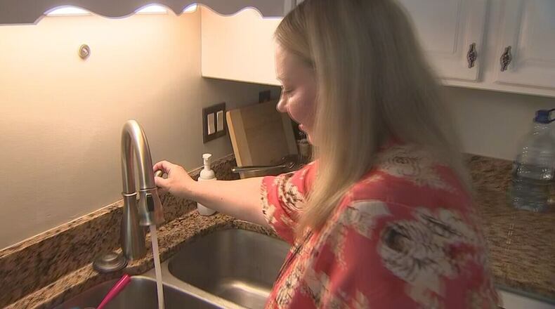 Home owners in Cobb County want to know why they are being charged so much in water bills. AJC file photo