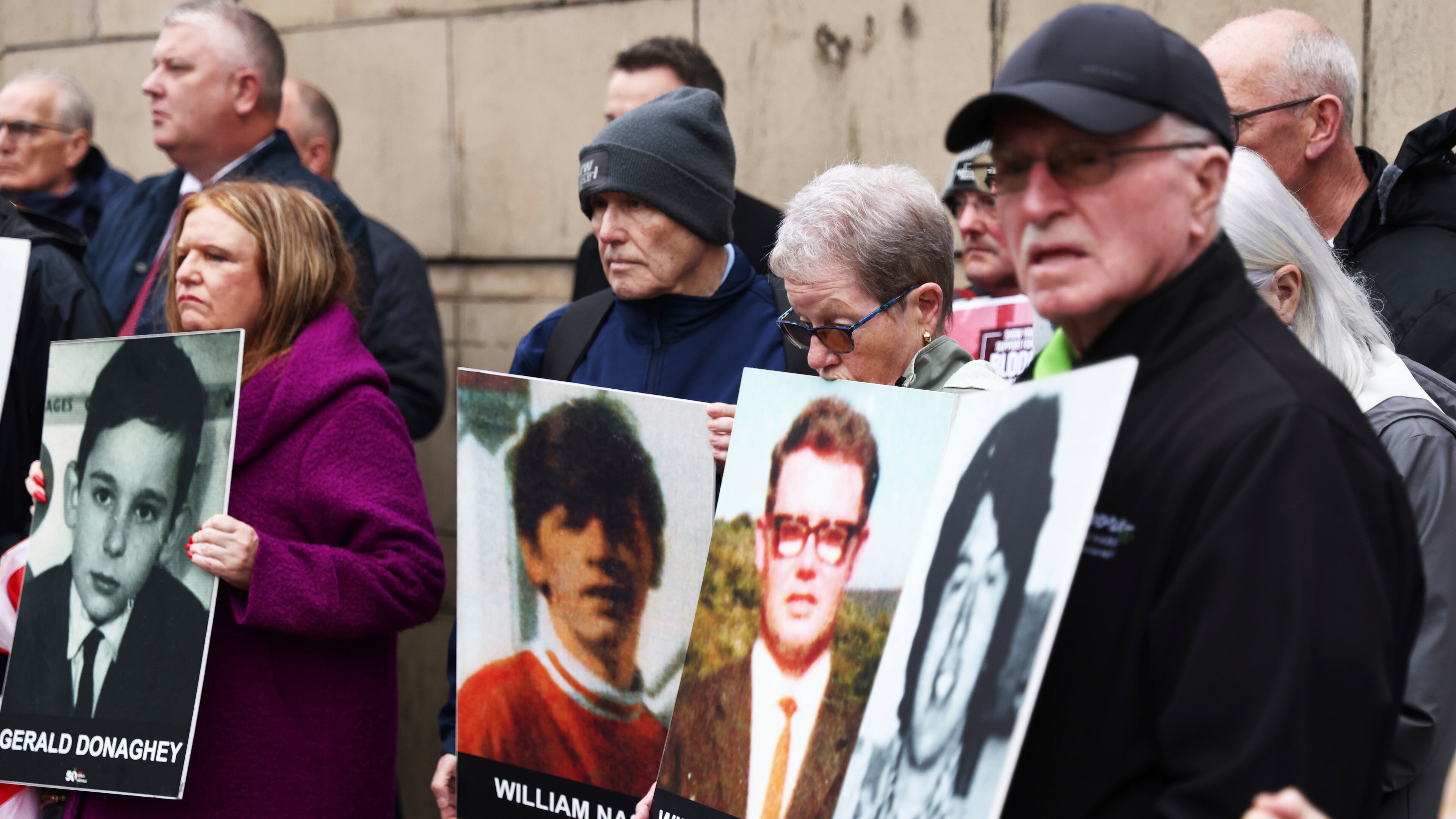 Families of the victims of the 1972 Bloody Sunday, hold a protest outside Belfast Crown court, Northern Ireland, Monday Sept. 15, 2025. (AP Photo/Peter Morrison)