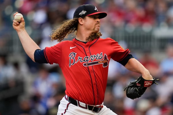 Atlanta Braves pitcher Grant Holmes (66) delivers against the Los Angeles Dodgers in the first inning of a baseball game, Friday, May 2, 2025, in Atlanta. (AP Photo/Mike Stewart)